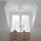 Maru Surface with a Natural shade shown in White with a Maple Wood canopy and Maru Lamp on dresser, Interiors by Jica Interiors