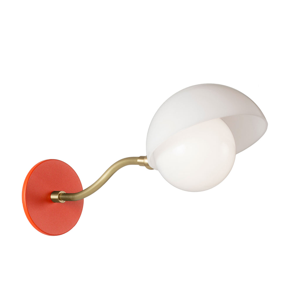 Noor Curve Sconce shown with a White Opal Acrylic Shade, Brass Arm, and Persimmon Canopy.