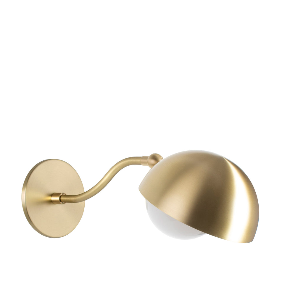 Noor Curve Sconce shown in Brass.