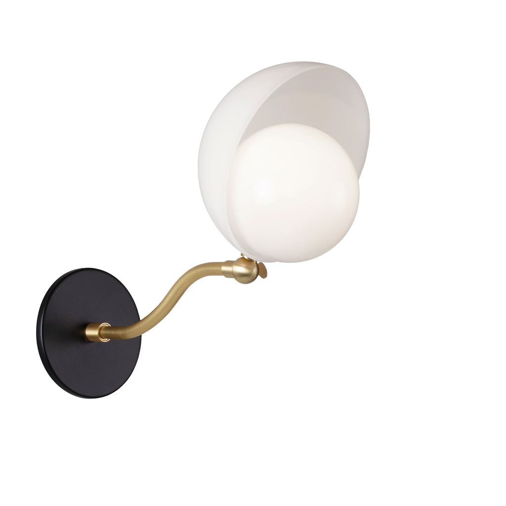 Noor Curve Sconce shown with a White Opal Acrylic Shade, Brass Arm and Matte Black Canopy.