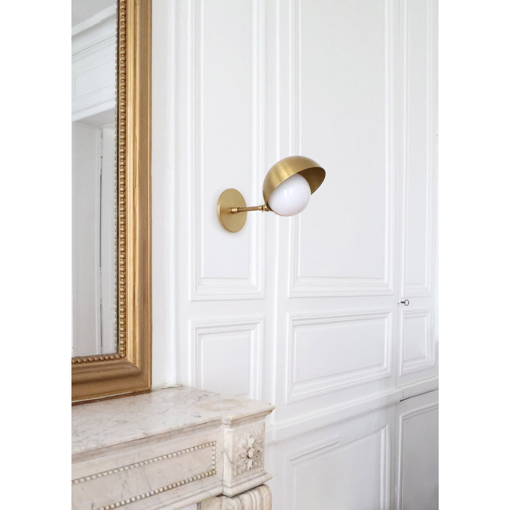 Noor Sconce shown in Heirloom Brass.