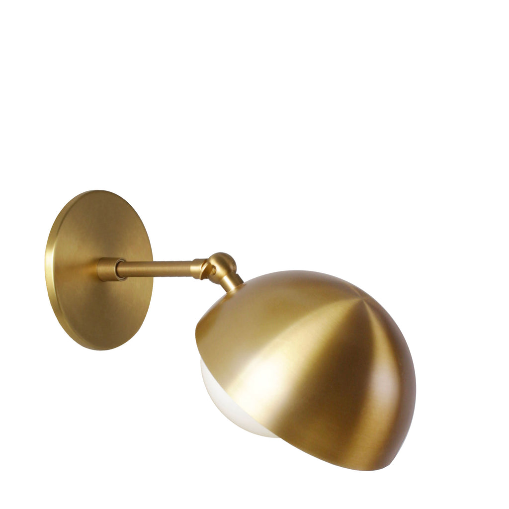 Noor Sconce in Heirloom Brass.