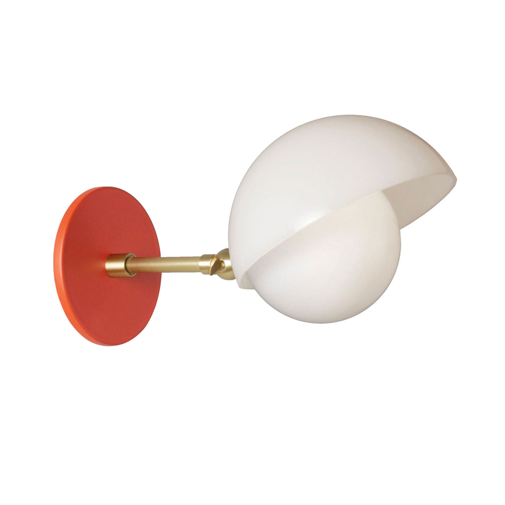 Noor Sconce shown with a White Opal Acrylic Shade, Brass Arm, and Persimmon Canopy.