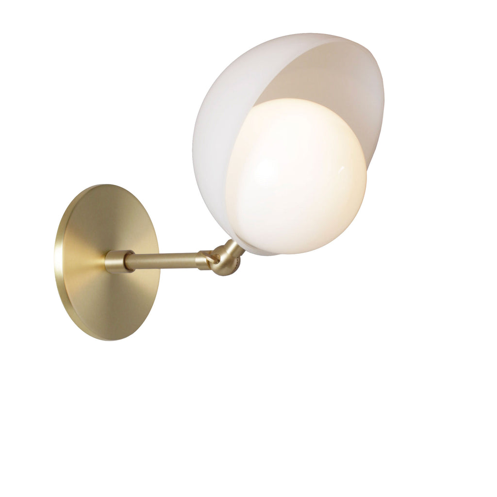 Noor Sconce shown in Brass with a White Opal Acrylic Shade