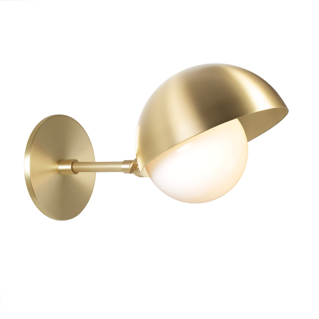 Noor Sconce shown in Brass.