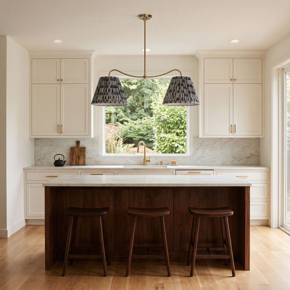 Oxford Grand Double Pendant shown in Heirloom Brass with Trulli Auburn Shades