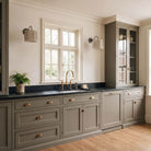 Oxford Petite Sconce shown in Graphite Patina with an Aspen Coco Scallop Shade