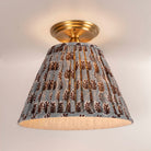 Oxford Surface shown in Heirloom Brass with a Trulli Auburn Shade