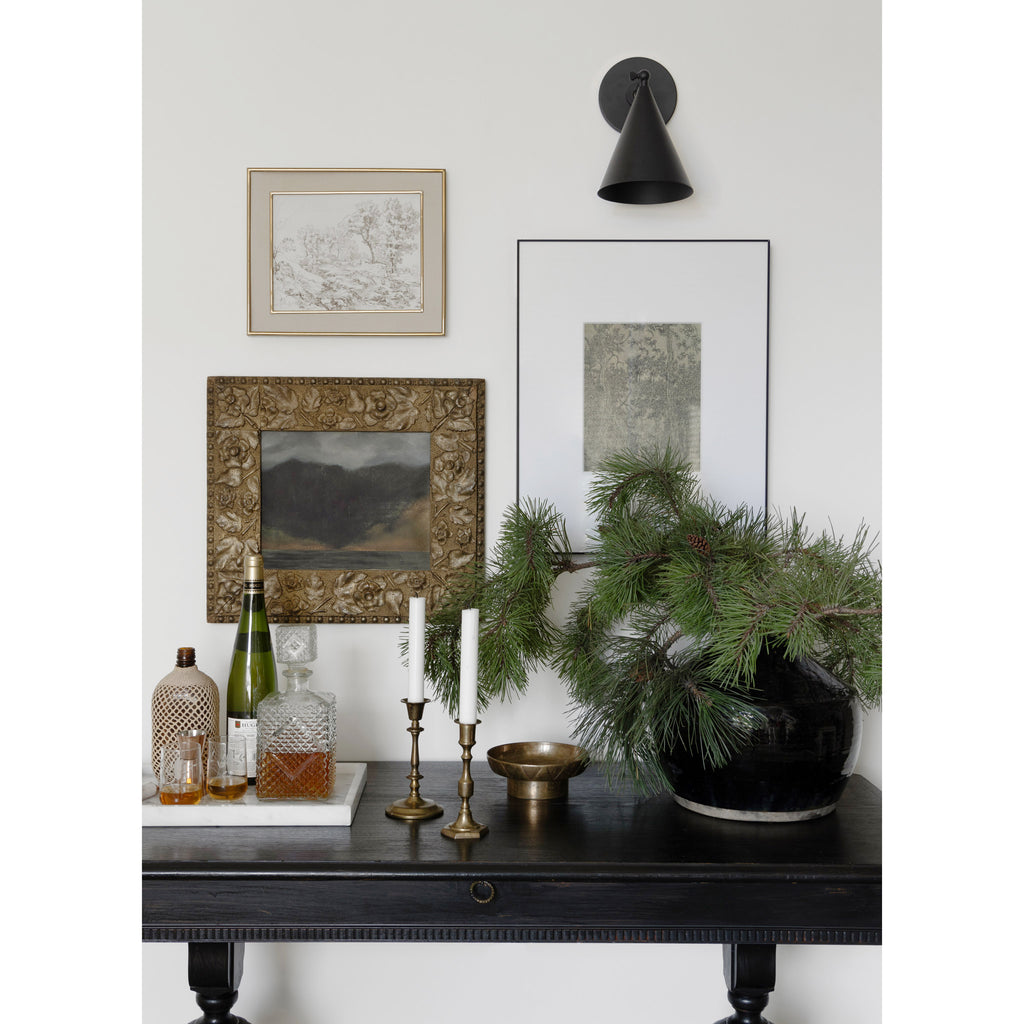 Petra Sconce shown in Matte Black with an 3" arm