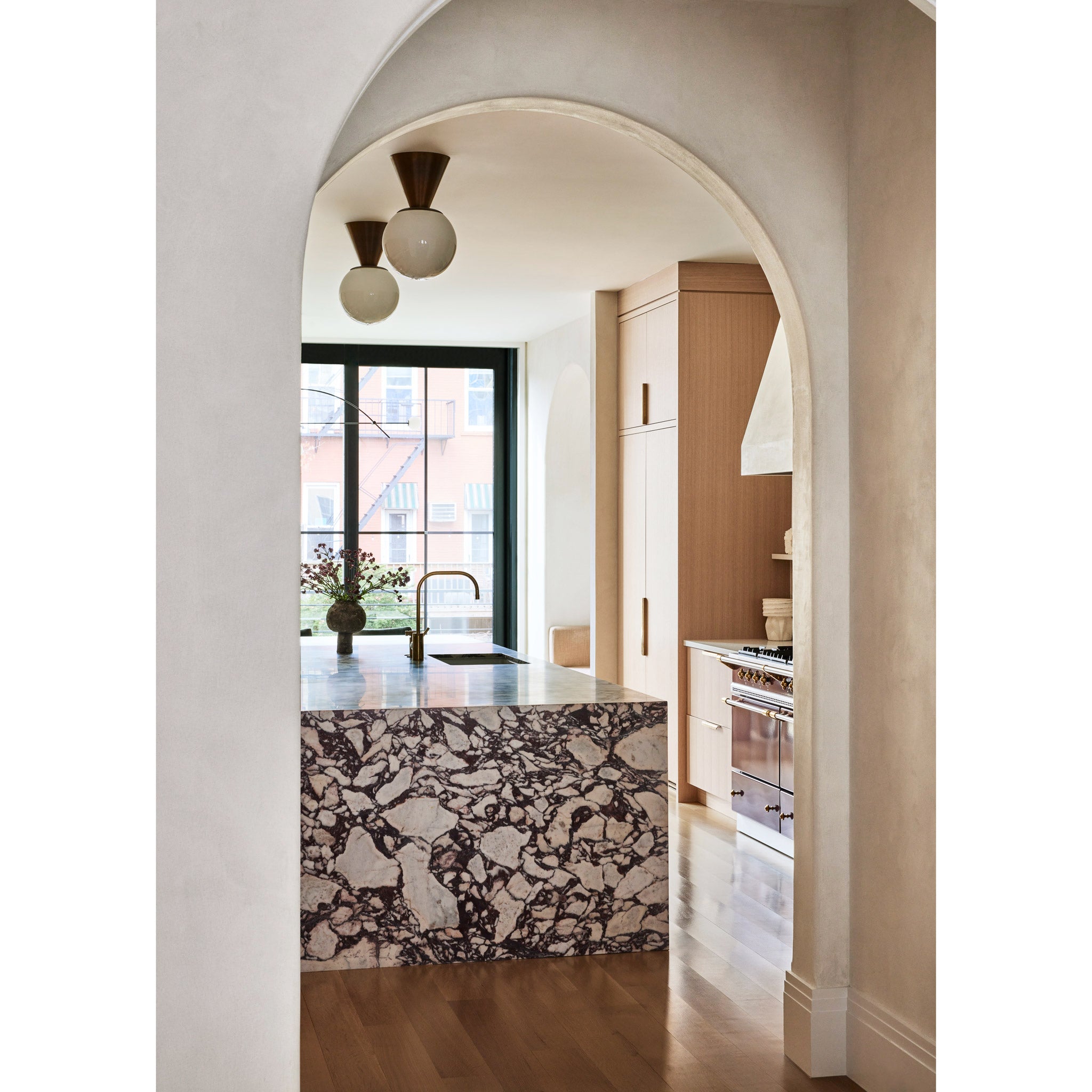 Summit 12" shown in Heirloom Brass. Interior design by Corvino Design. Photo by Nicole Franzen