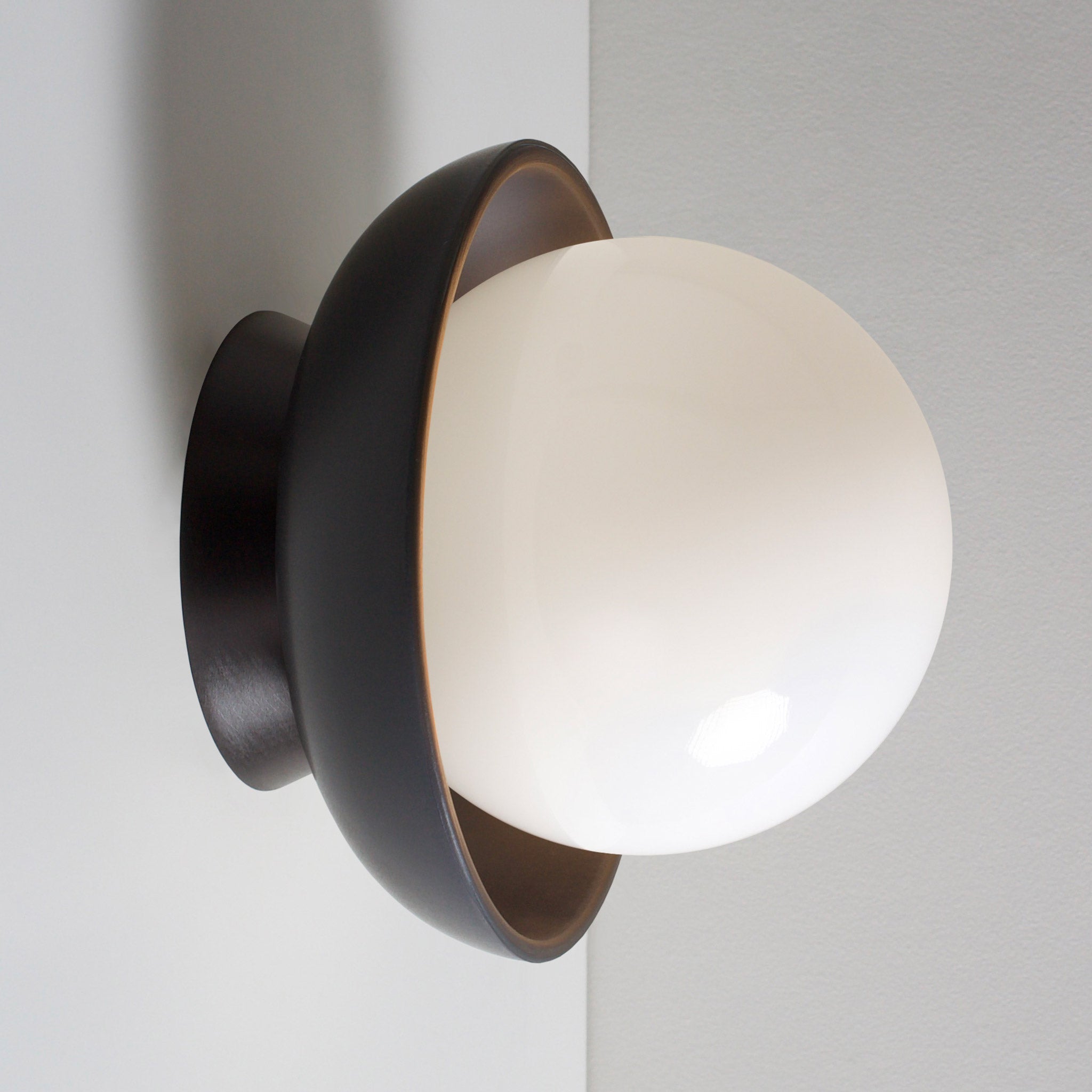 Terra Lexi shown in Eclipse Black Glaze ceramic with Black Stained wood canopy