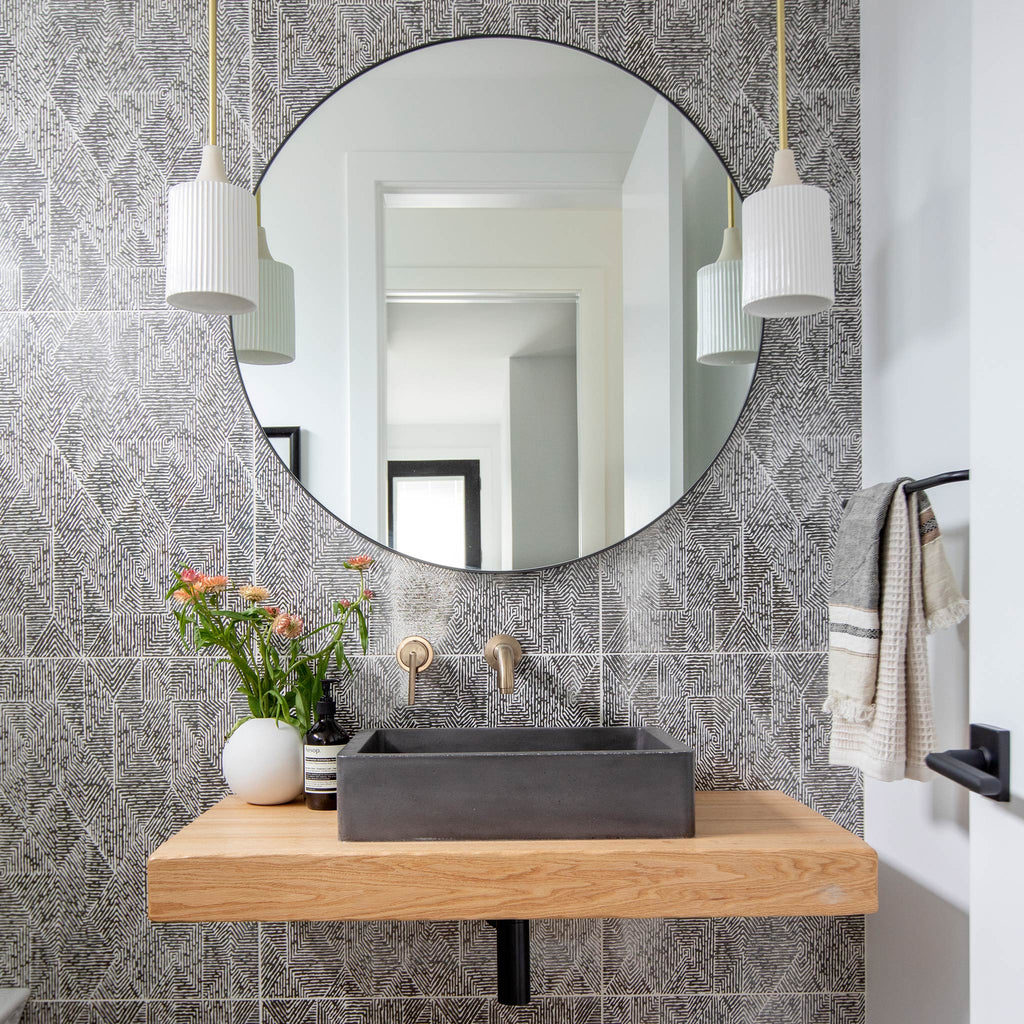 A Tumwater Pendant Lights Installed In The Bathroom