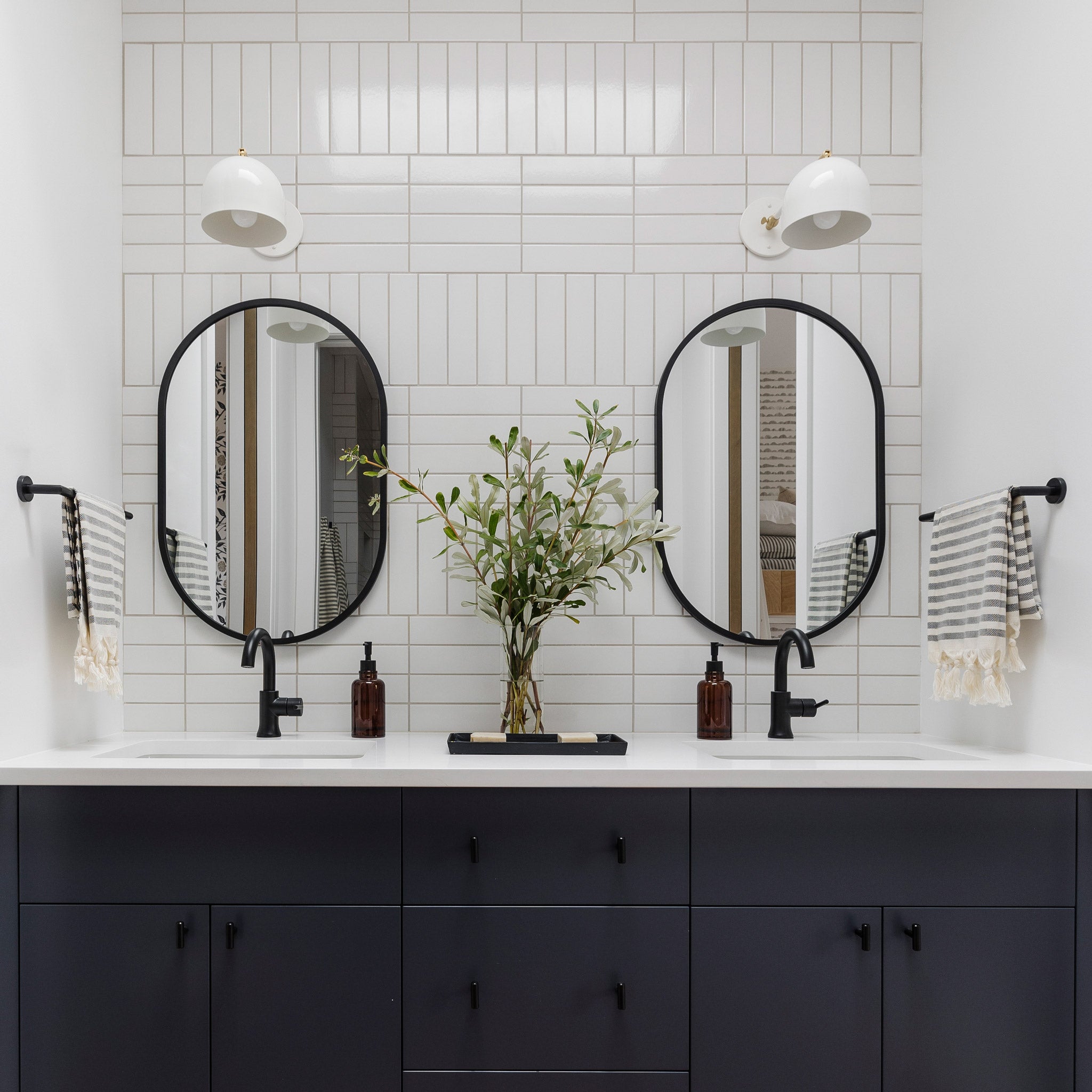 Amélie Single Articulated 8" in shown in White with Brass Accents. Interior Design by Alykhan Velji Designs