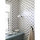 Archie Single shown in Graphite Patina with a Gloss White Ceramic Canopy shown with Marigold wallpaper and fabric from Filling Spaces 