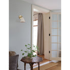 Petra Ceramic Sconce shown in Brass