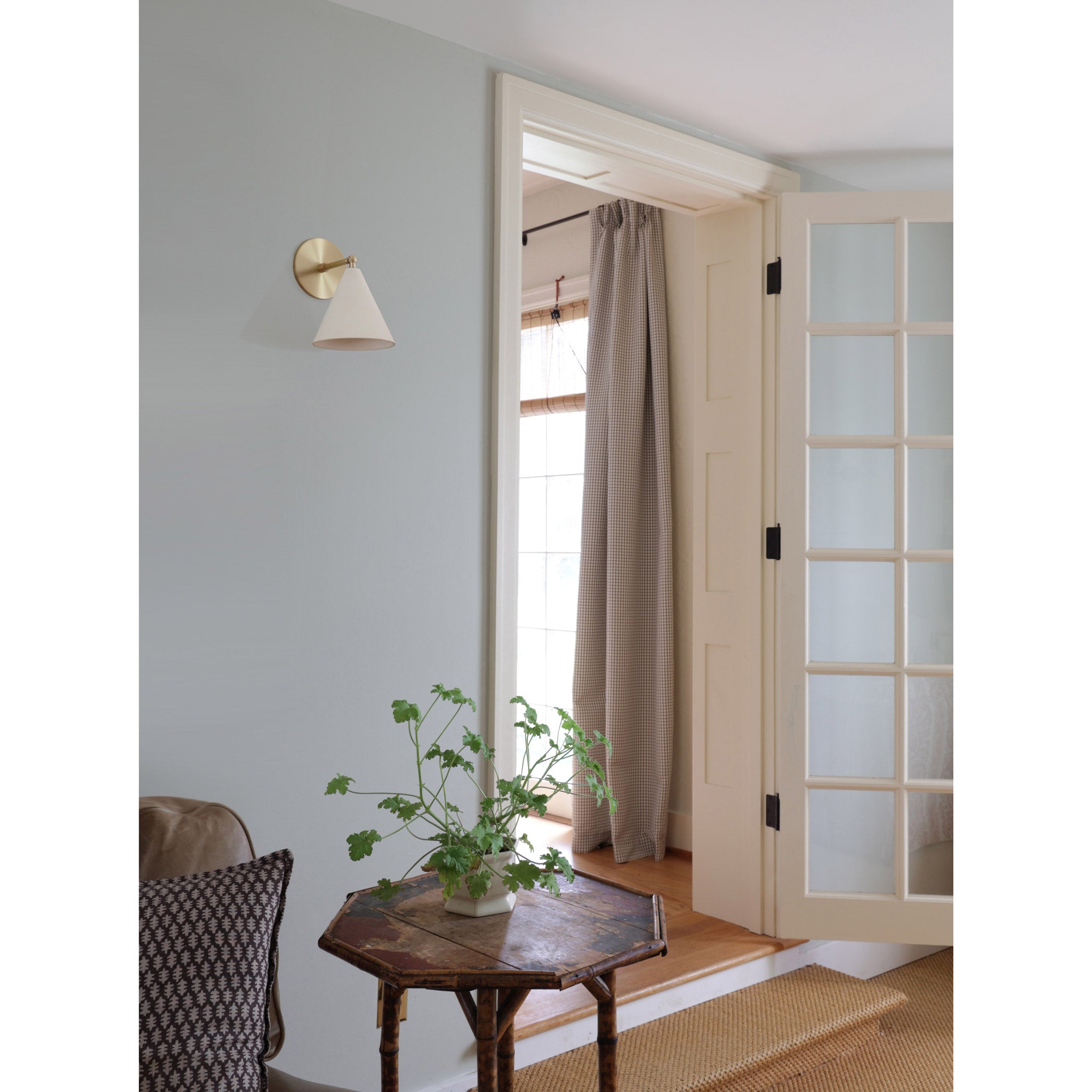 Petra Ceramic Sconce shown in Brass