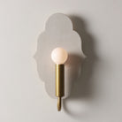 Clare Ceramic Sconce shown in Heirloom Brass with a Natural White Glaze 
