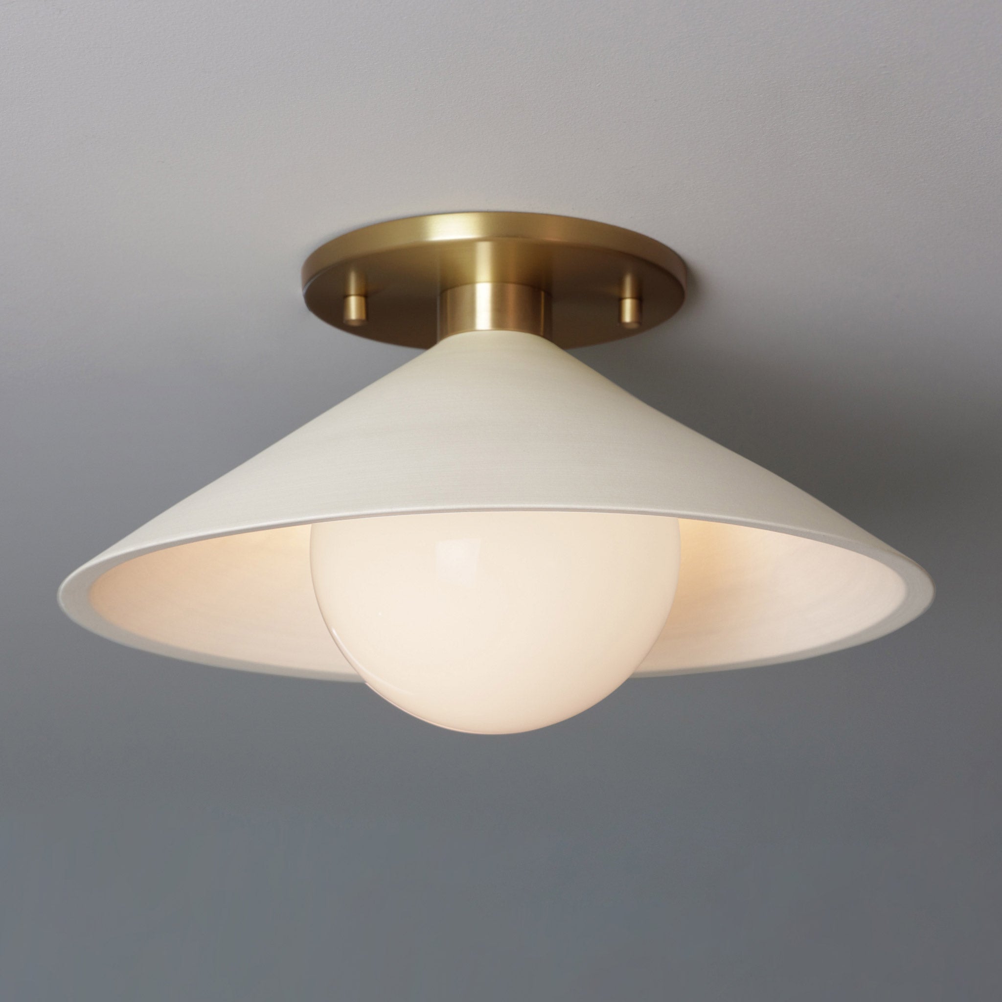 Elvia Surface shown in Heirloom Brass