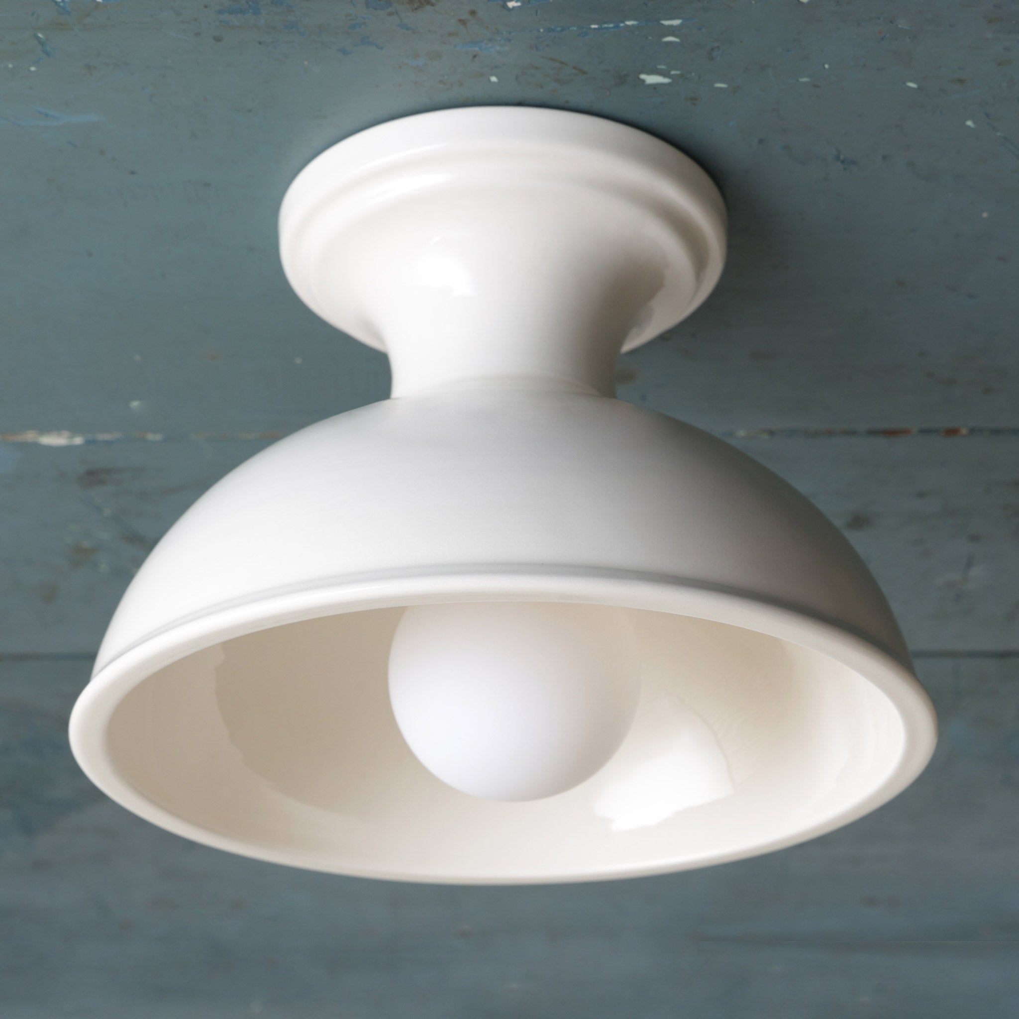 Emma shown in Gloss White Glaze with a Tala Sphere II Light Bulb