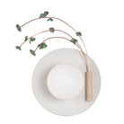 Ikebana Sconce shown in Natural White Glaze with Verdigris flower finish and Right mounted vase