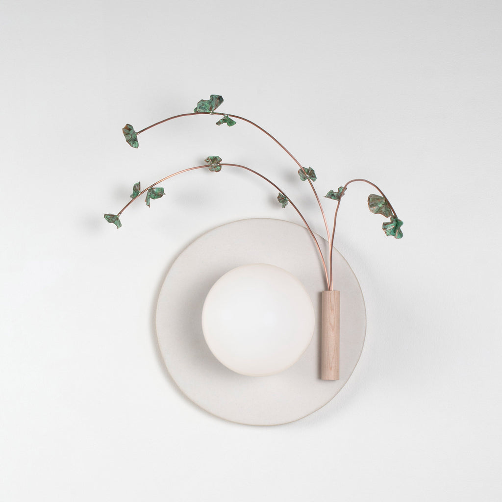 Ikebana Sconce shown in Natural White Glaze with Verdigris flower finish and Right mounted vase.