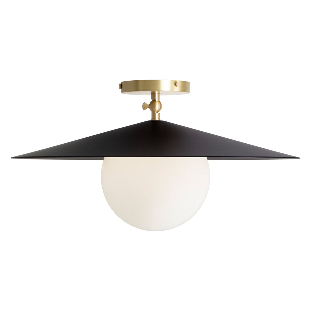 Marie Majeure Surface shown in Matte Black with Brass.