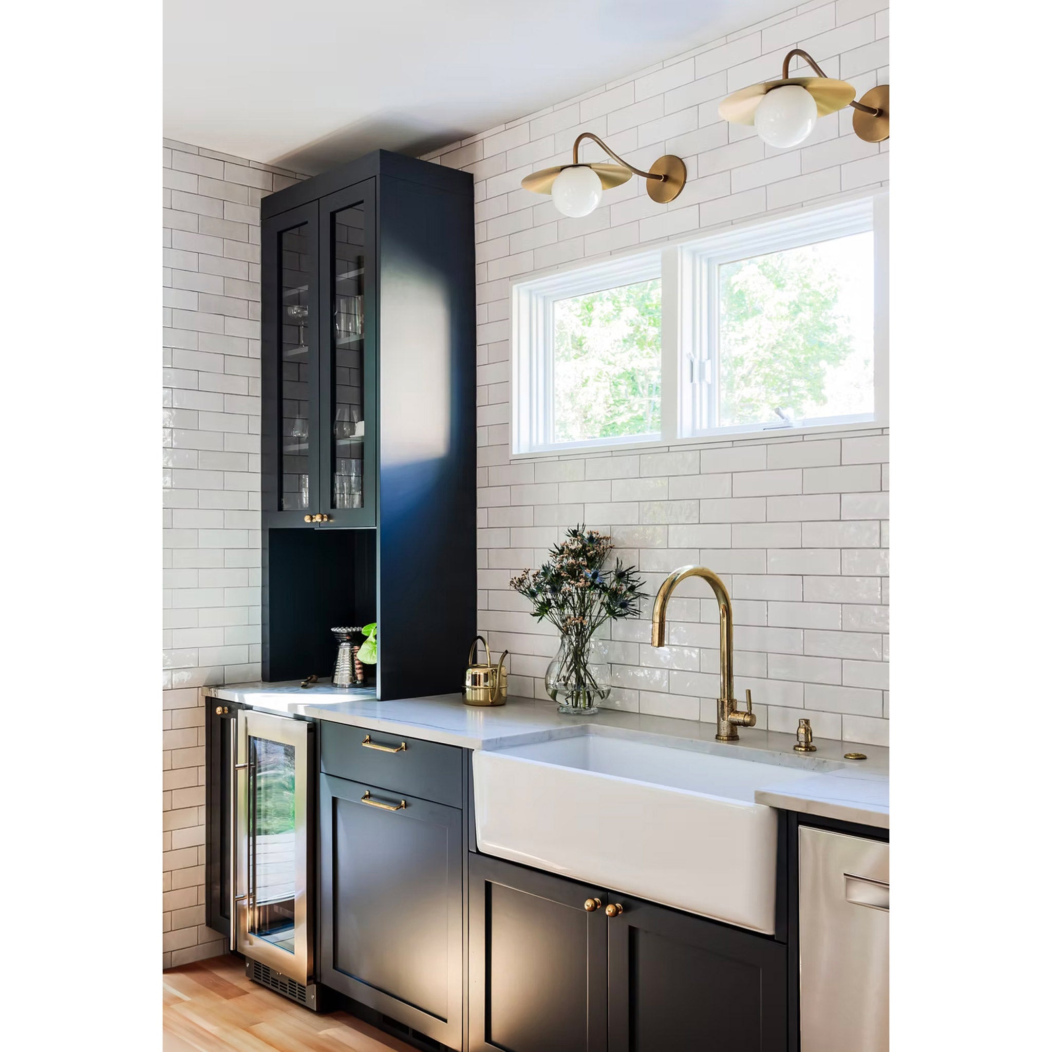 Marie Sconces shown in Heirloom Brass. Interior Design by Wise Design