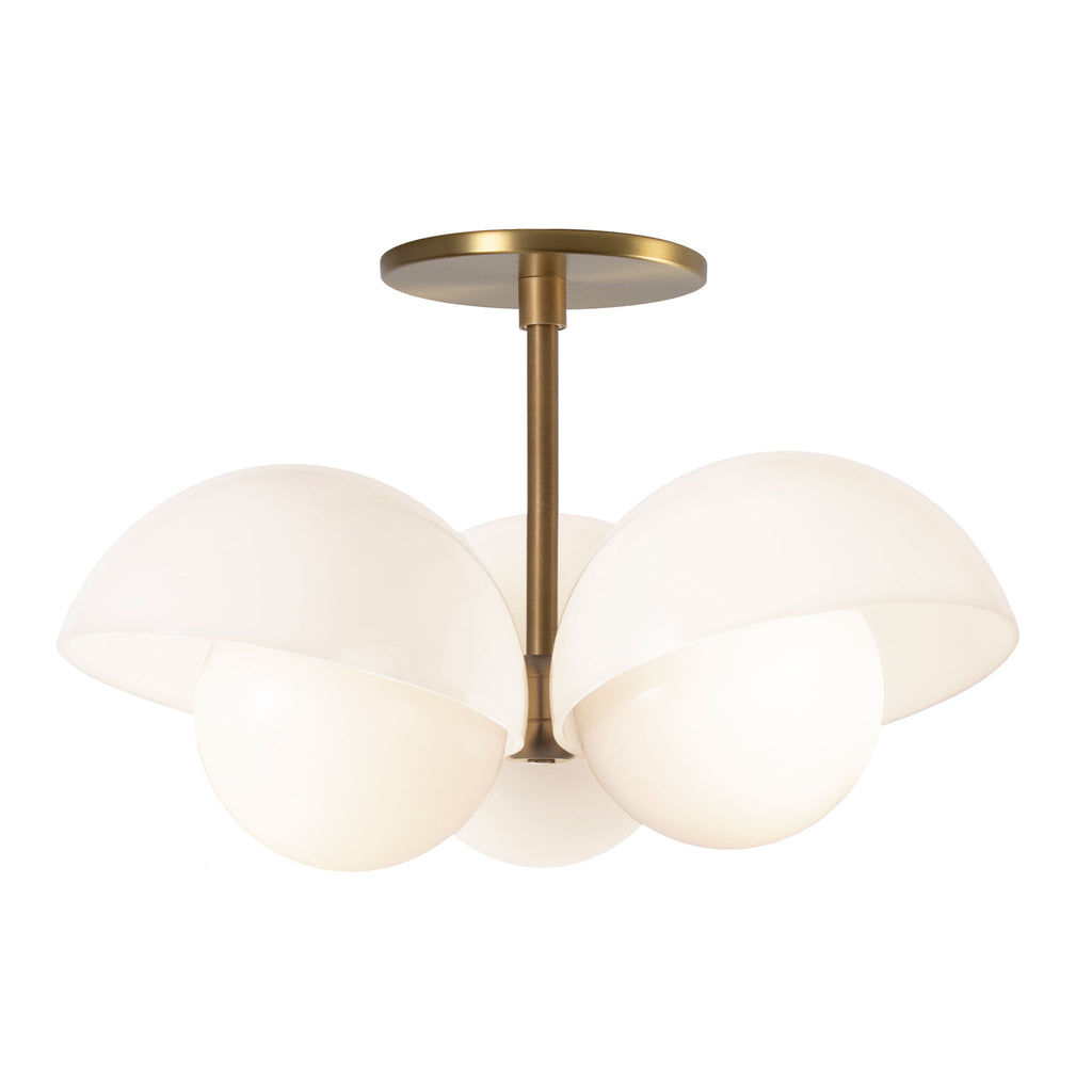 Noor 3 Surface shown in Heirloom Brass with White Opal Acrylic Shades.