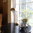 Noor Table Lamp shown in Heirloom Brass