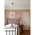 Allison Large shown in Gloss Coral Rose ceramic, Josephine Lamp in Matte Black. Interior design by Sarah J. Meyer Design