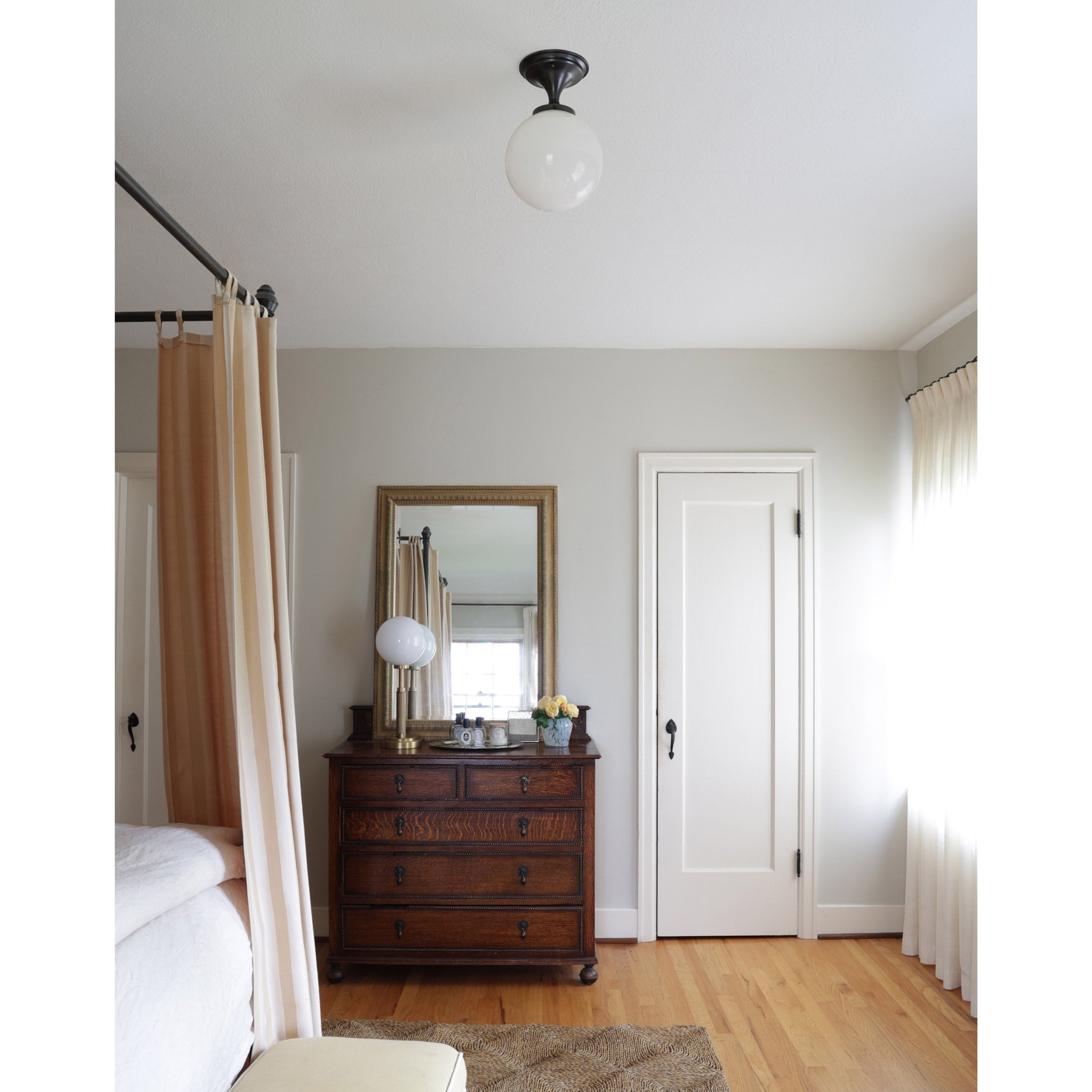 Sorbonne Surface 10" Globe shown in Graphite Patina. Interior design by Sarah J. Meyer Design