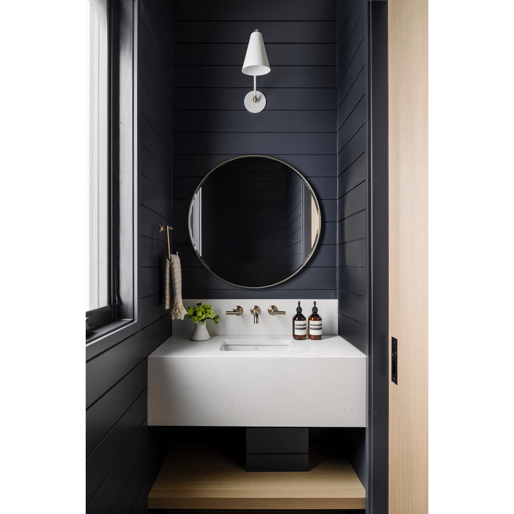 Tilt Cone Single Articulated in White and Brass. Interior design by Alykhan Velji Designs