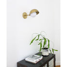 Noor Sconce shown in Heirloom Brass