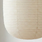 The elongated form of our Umi washi lantern draws from traditional lantern silhouettes