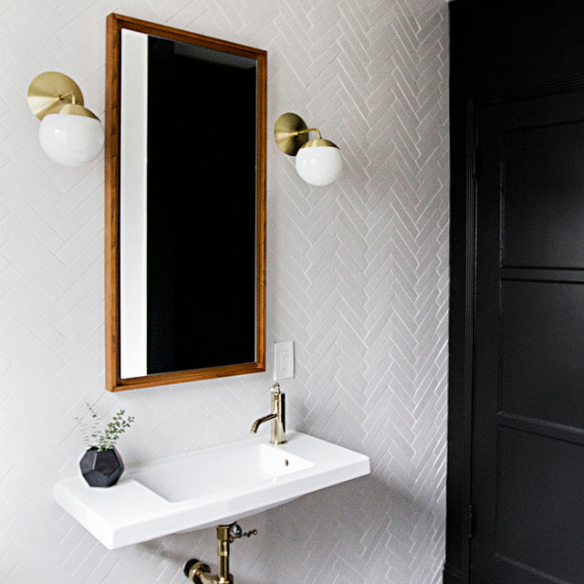 Alto Sconce 6" shown in Brass with an Opal 6" globe. Interior design by Sarah Sherman Samuel. 
