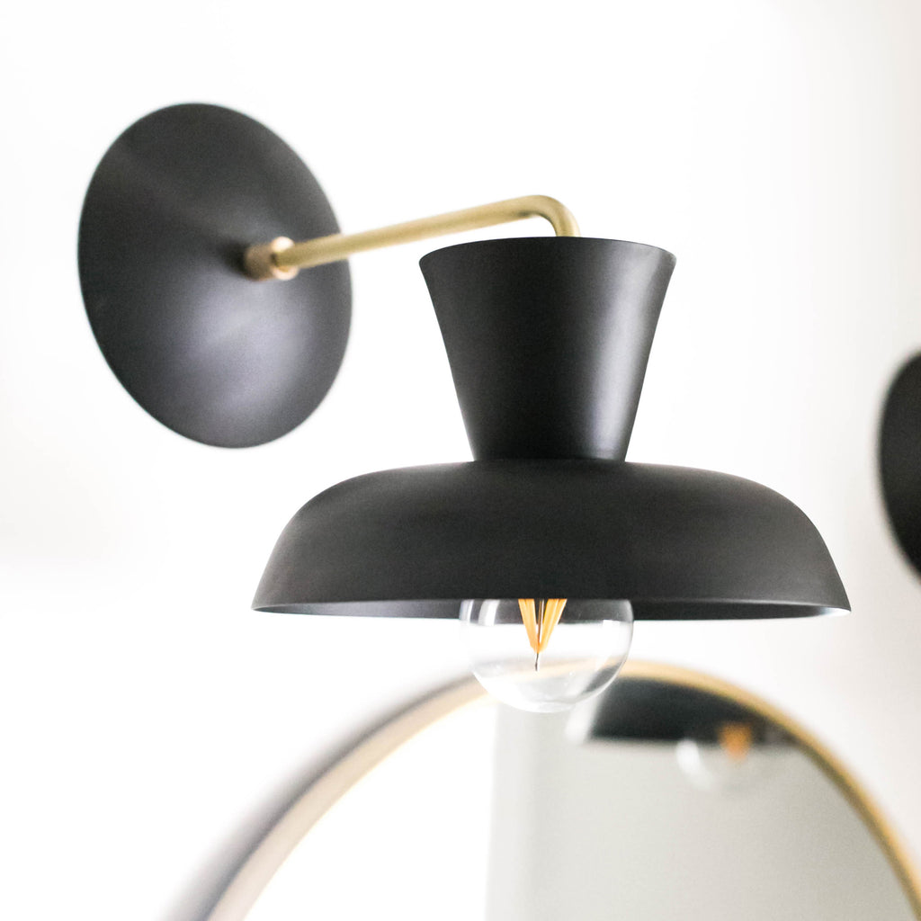 Isle Sconce shown in Matte Black with Brass.