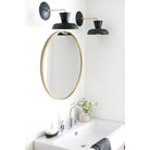 Isle Sconces shown in Matte Black with Brass. Interior Design by Ames Interiors