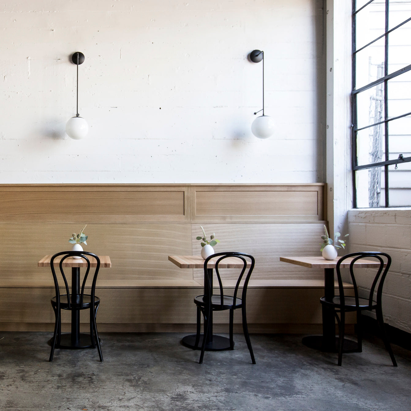 Ramona 10" shown in Matte Black with Opal 10" globes. Interior design by Casey Keasler of Casework Design. Photo by Carly Diaz