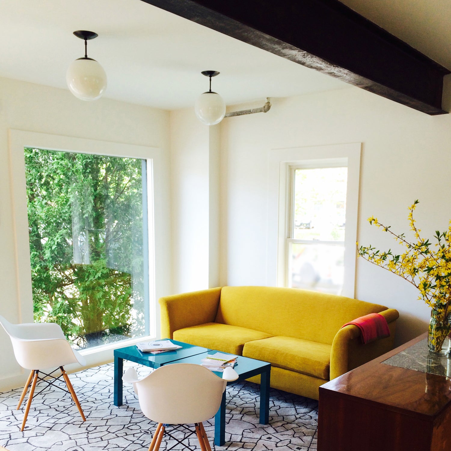 Alto Surface 10" shown in Matte Black with an Opal 10" Globe.  Interiors by Five Line Creative