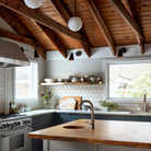 Tilt Cone shown in Matte Black with a 12" arm. Interior design and Photo by Jason Varney