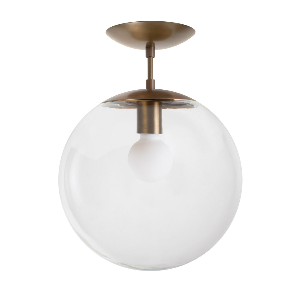 Alto Surface 12" shown in Heirloom Brass with a Clear 12" Globe.