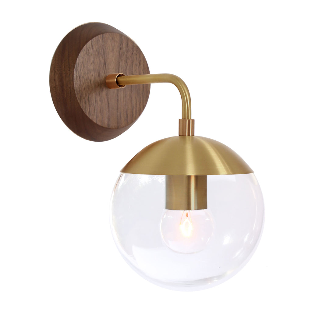 Alto Sconce 6" with Wood Canopy shown in Brass and Walnut canopy with a Clear 6" globe.