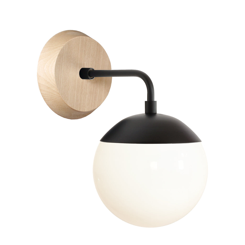 Alto Sconce 6" with Wood Canopy shown in Matte Black and Maple canopy with an Opal 6" globe.