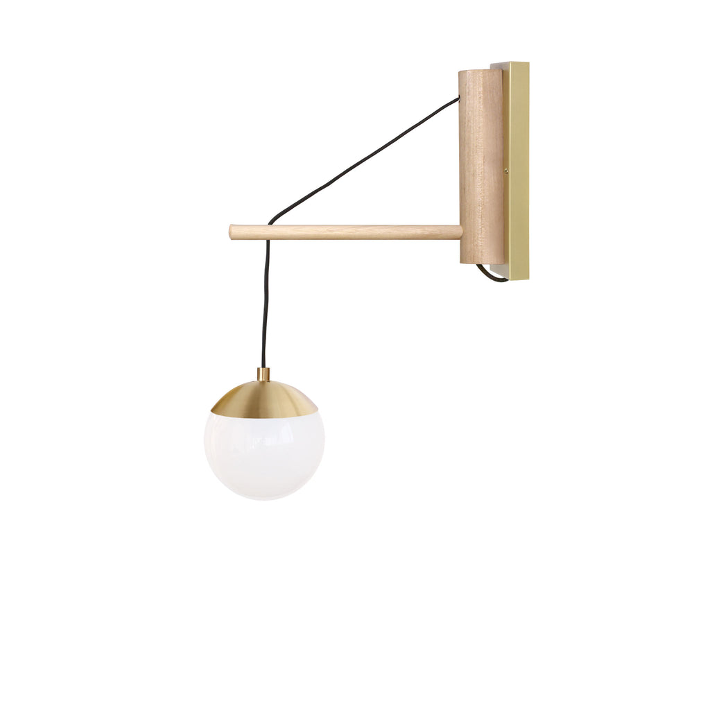 Alto 14" Wood Arm Sconce shown in Brass with Birch, a 6" Opal globe, and a Black Hardwired Cord.