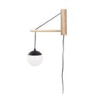 Alto 14" Wood Arm Sconce shown in Matte Black with Birch, a 6" Opal globe, and a Black Plug-in Cord