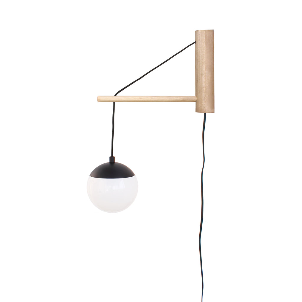 Alto 14" Wood Arm Sconce shown in Matte Black with Birch, a 6" Opal globe, and a Black Plug-in Cord.