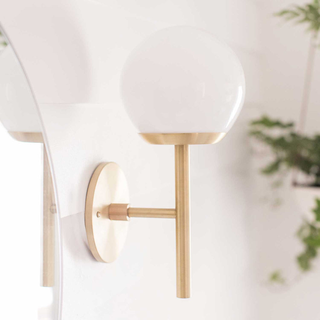 Athena 6" shown in Brass with an Opal 6" globe. Interior Design by Sarah Sherman Samuel for Sugar and Charm.  
