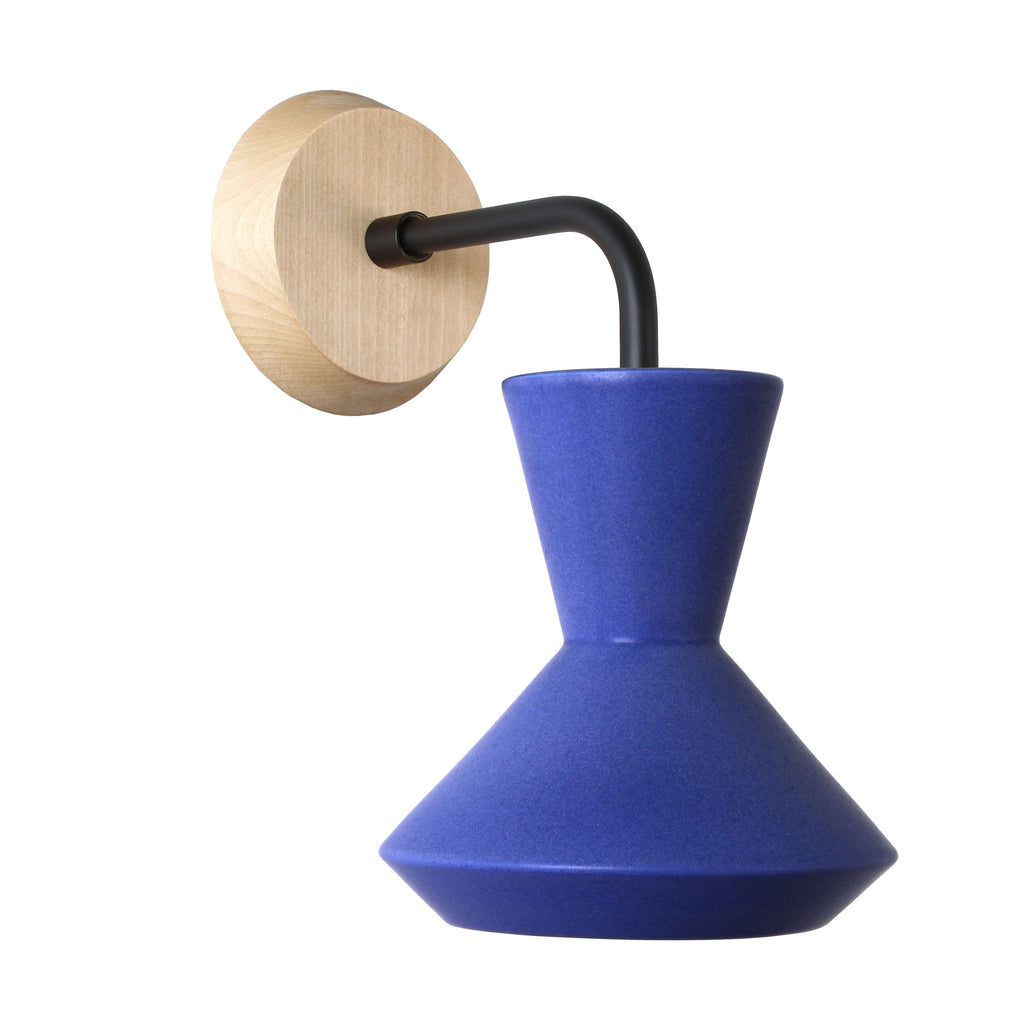 Bobbie Sconce shown in Cobalt Blue Glaze with Matte Black Metal and Maple Canopy.