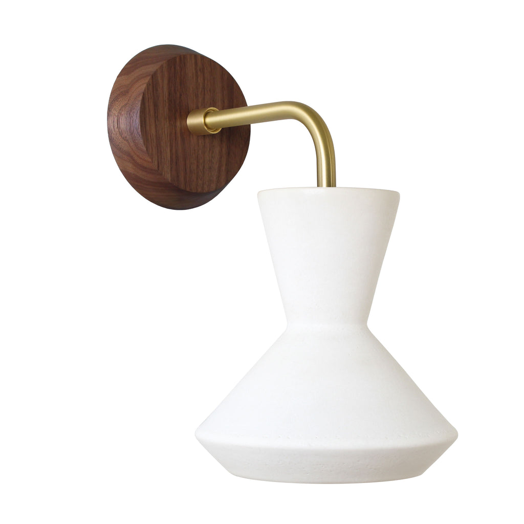 Bobbie Sconce shown in Natural White Glaze with Brass Metal and Walnut Canopy. 