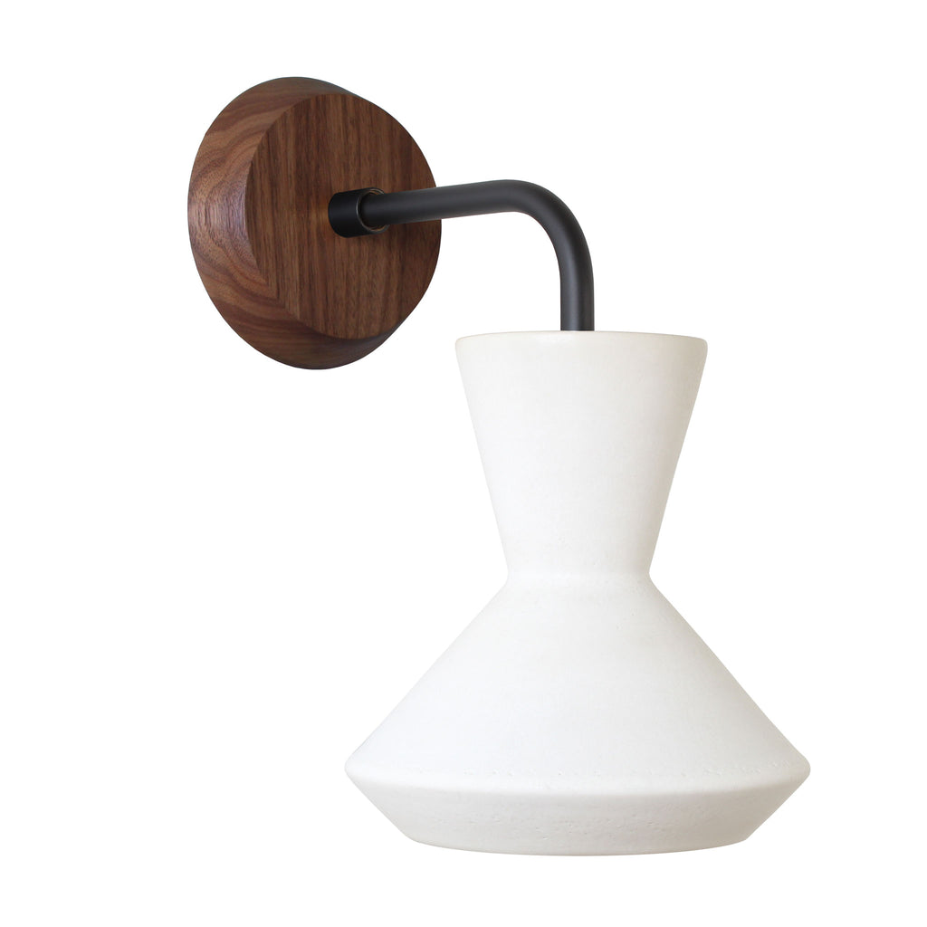 Bobbie Sconce shown in Natural White Glaze with Matte Black Metal and Walnut Canopy.